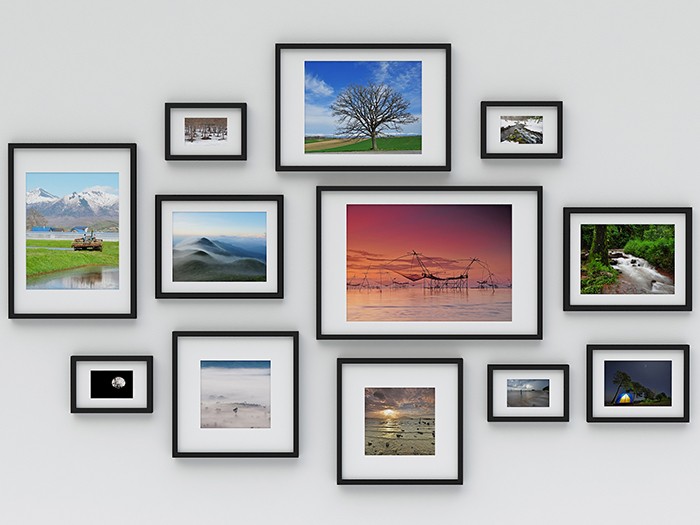 Photo frame on wall (3d rendering)